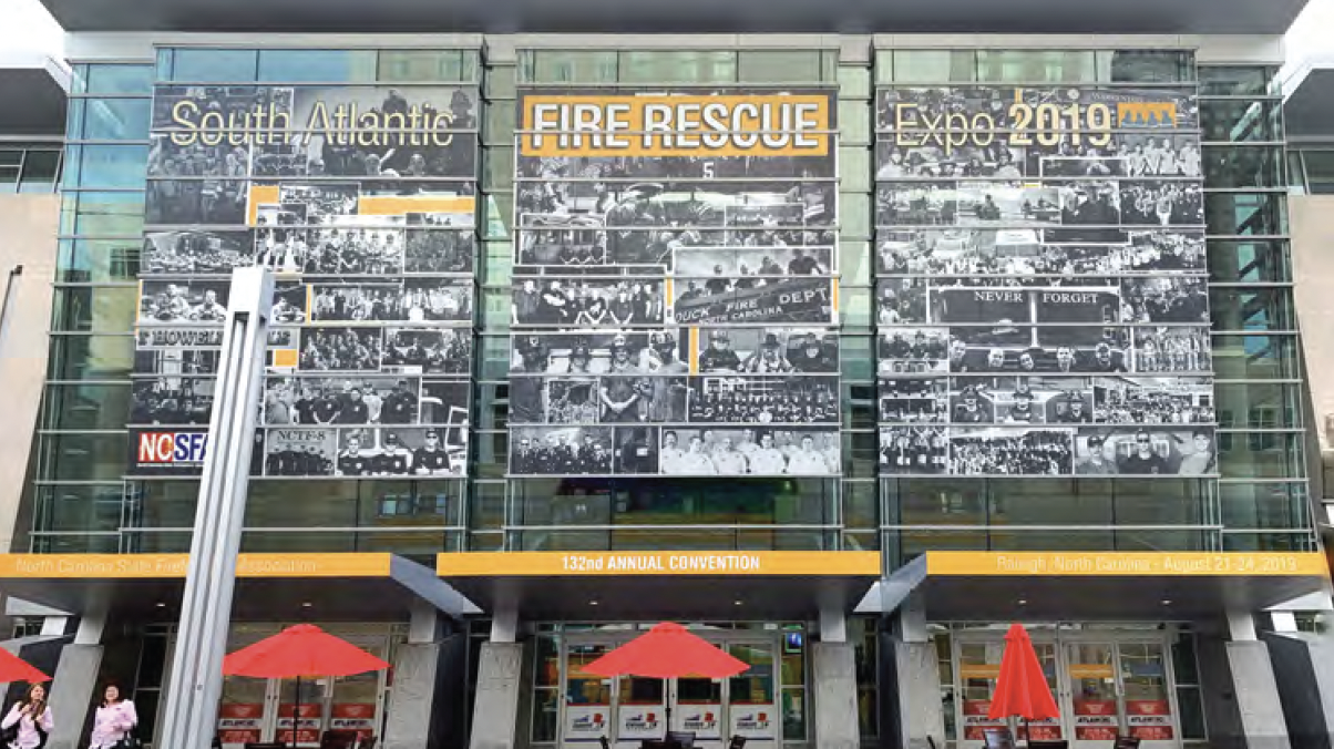 Front of RCC showing client branding on windows.